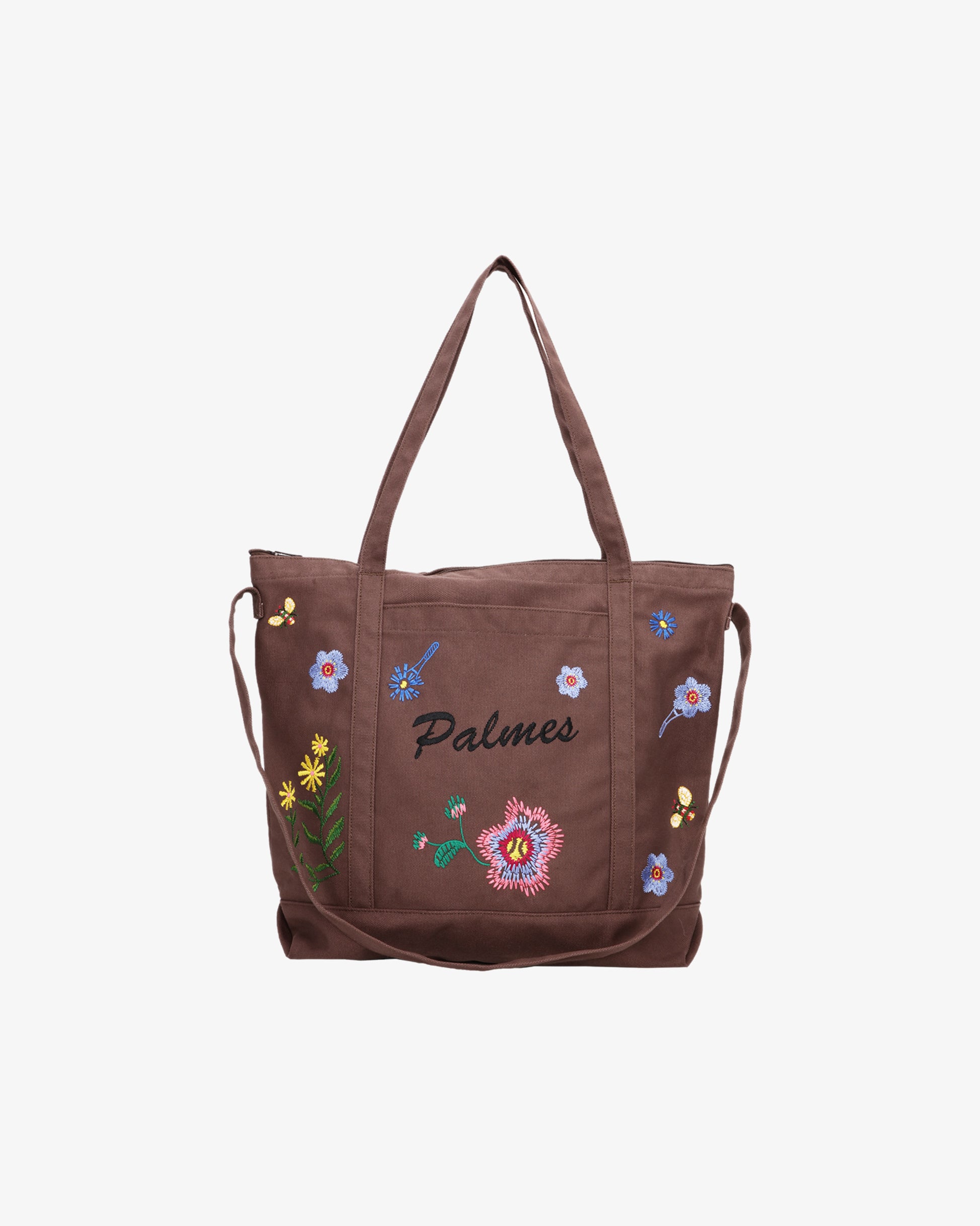 Palmes Tennis - A brown canvas tote bag with embroidered flowers and the word "Palmes" on the front.